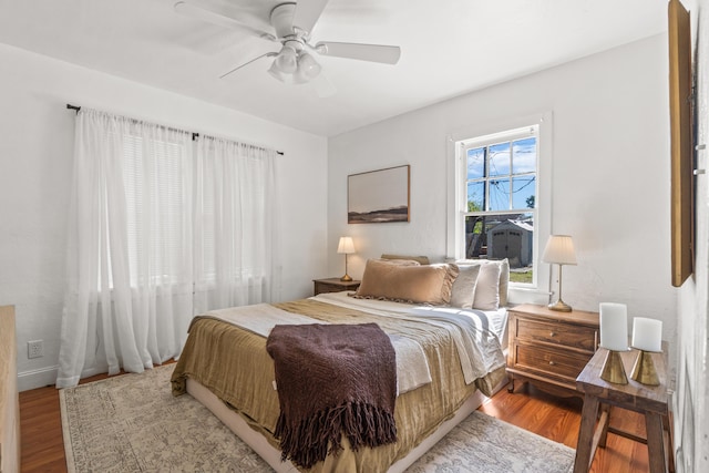 bedroom featuring ceiling fan and light wood-type flooring