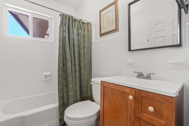 full bathroom featuring vanity, tile walls, shower / bath combo, and toilet