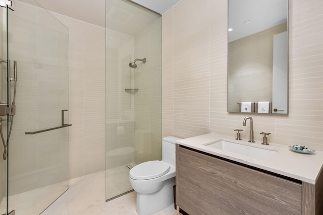 bathroom featuring a shower stall, tile walls, toilet, tile patterned floors, and vanity