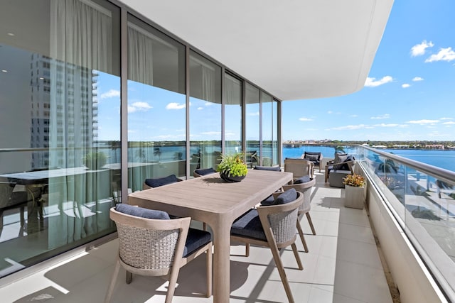 balcony featuring a water view