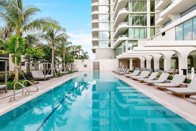 community pool featuring a patio area