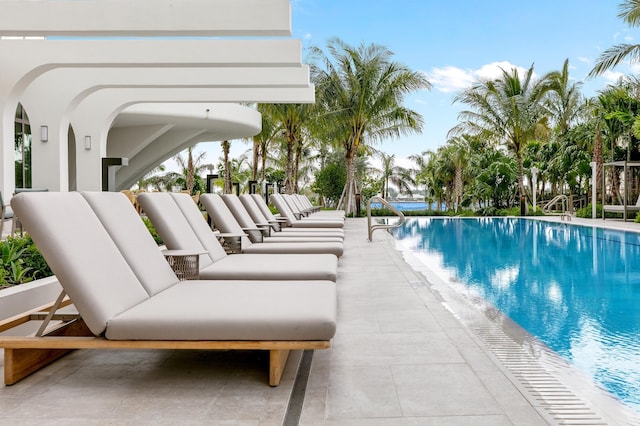 pool with a patio area