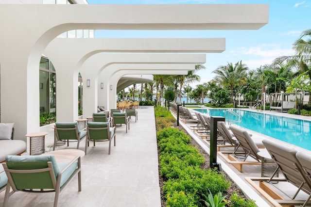 view of pool featuring a fenced in pool and a patio area