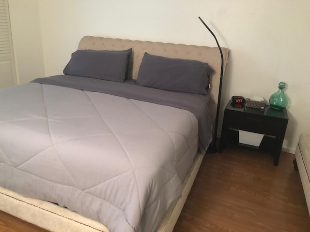 bedroom featuring hardwood / wood-style flooring