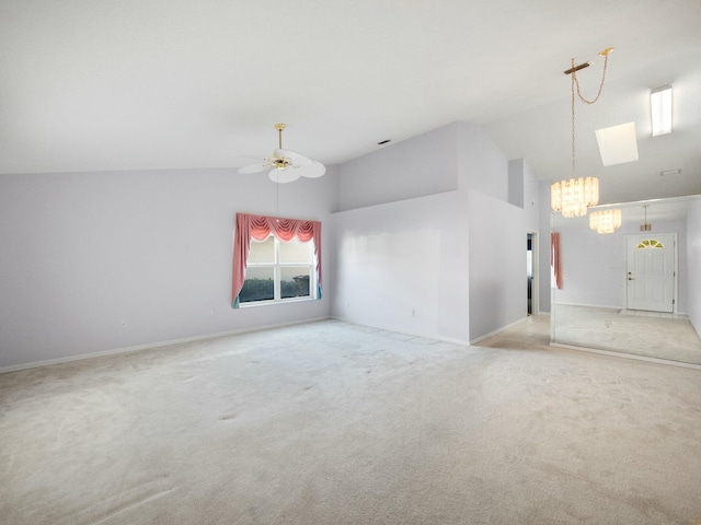 unfurnished living room featuring high vaulted ceiling, light colored carpet, and ceiling fan