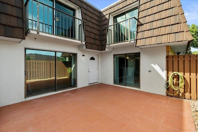 back of house with a patio area