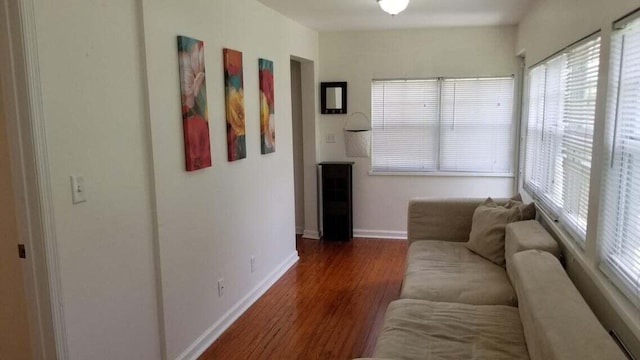 living room featuring dark hardwood / wood-style floors