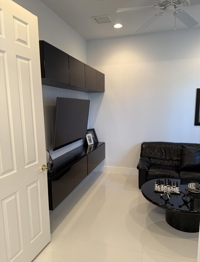 washroom with cabinets, sink, light tile patterned floors, and washer and clothes dryer