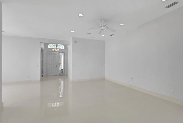 unfurnished room with ceiling fan