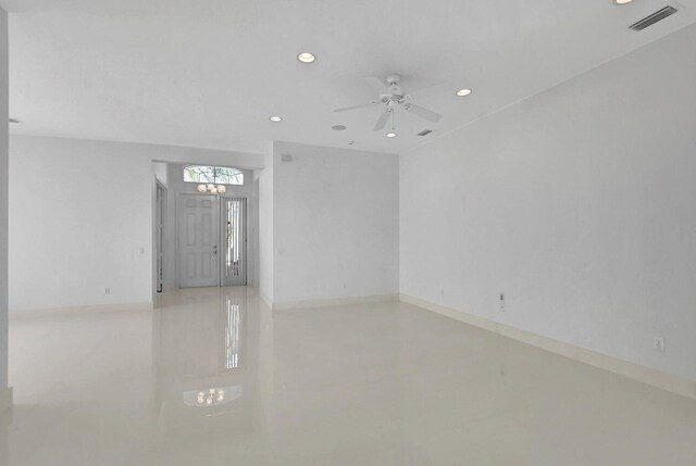 kitchen featuring sink, white cabinets, hanging light fixtures, kitchen peninsula, and stainless steel appliances