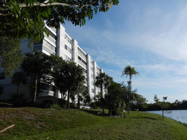 view of property with a water view