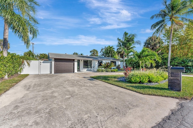 single story home with a garage