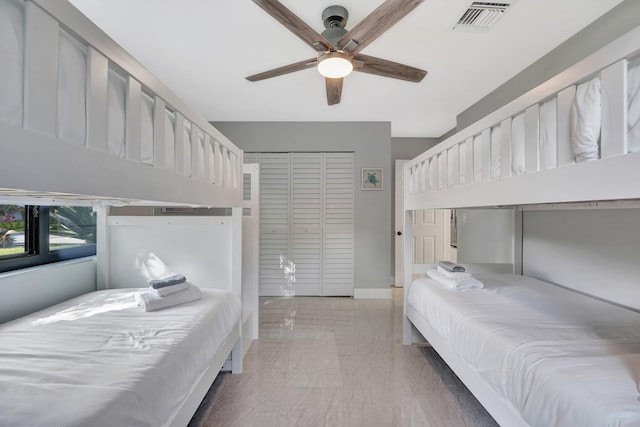 bedroom featuring ceiling fan