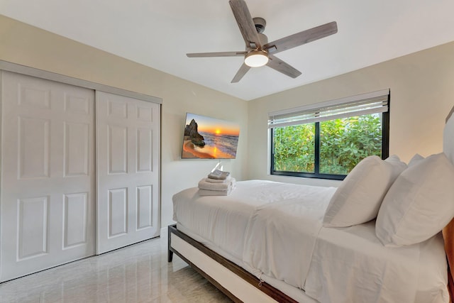 bedroom featuring a closet and ceiling fan