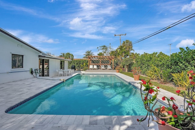 view of swimming pool featuring a pergola and a patio