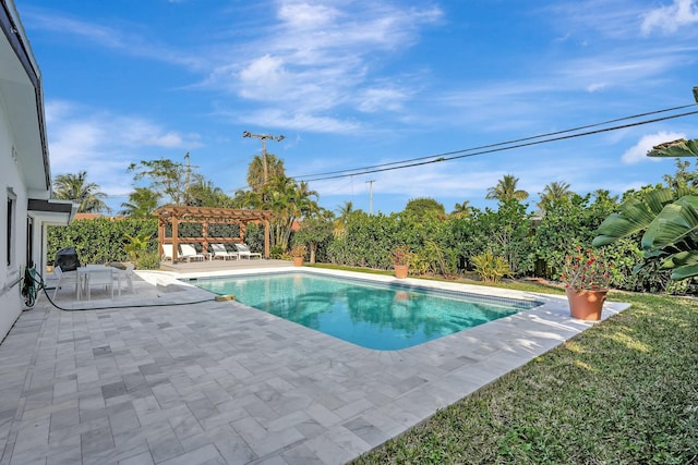 view of pool with a patio and a pergola