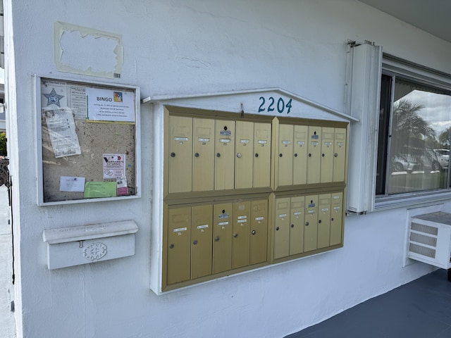 view of community featuring mail boxes