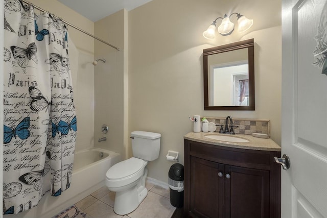 full bathroom featuring shower / tub combo, backsplash, vanity, tile patterned floors, and toilet