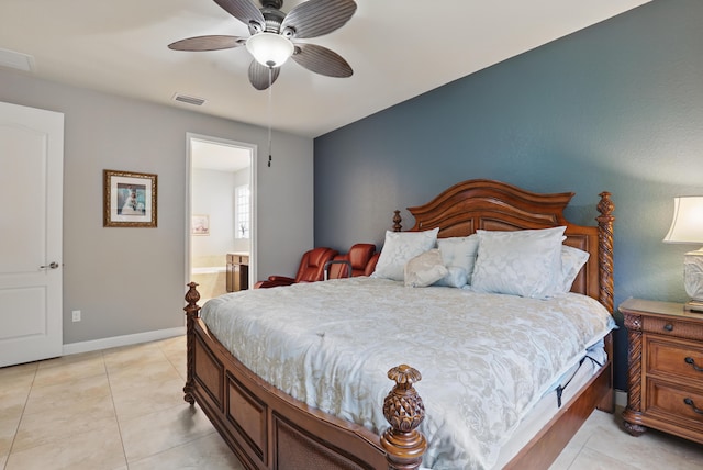 tiled bedroom featuring connected bathroom and ceiling fan