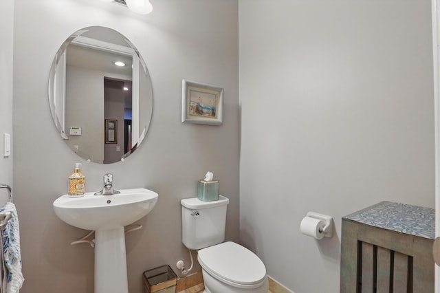 bathroom featuring toilet