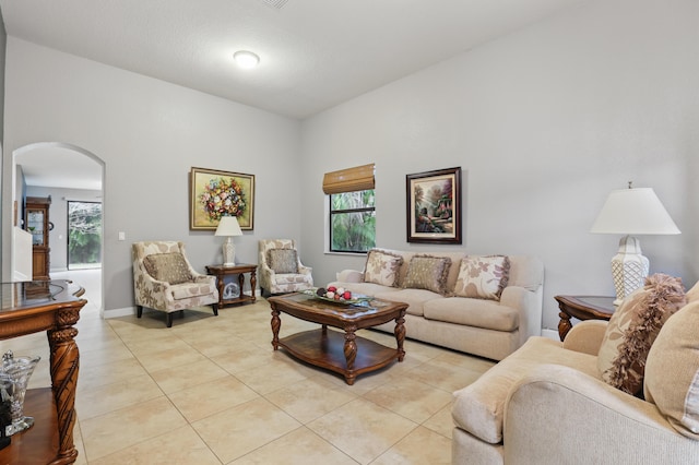 living room with light tile patterned flooring