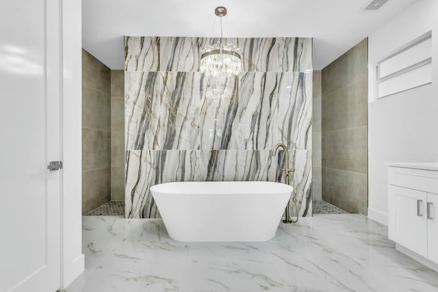 bathroom featuring vanity, tile walls, plus walk in shower, and a chandelier