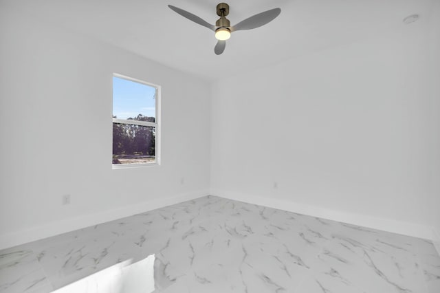 unfurnished room with ceiling fan