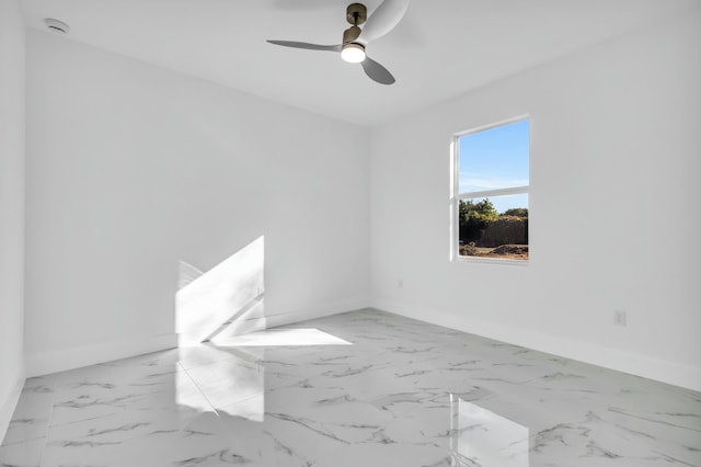 empty room featuring ceiling fan