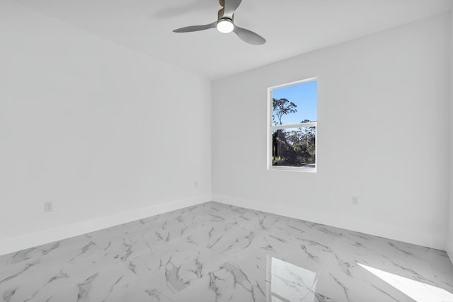 spare room featuring ceiling fan