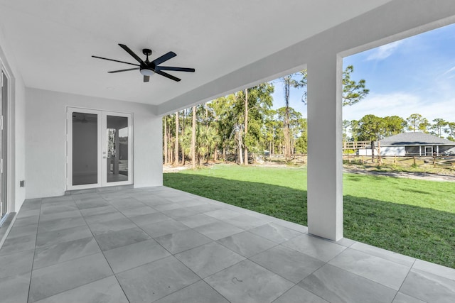 view of patio / terrace with ceiling fan and french doors