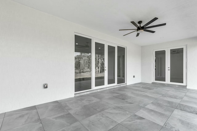 view of patio with ceiling fan and french doors