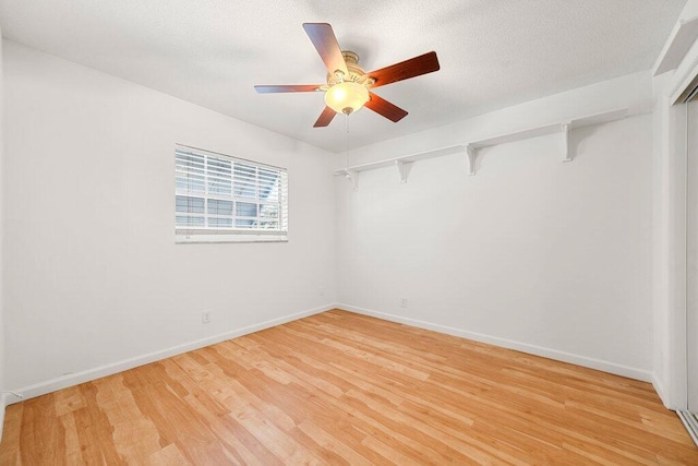 unfurnished room with light hardwood / wood-style floors and ceiling fan