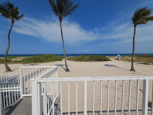 property view of water featuring a beach view