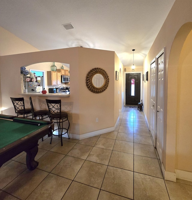 interior space featuring tile patterned flooring