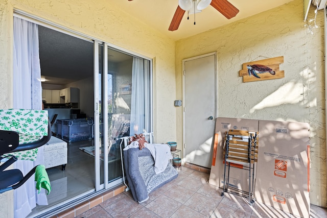 exterior space with a patio and ceiling fan