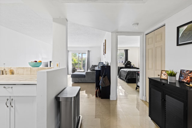 interior space with a textured ceiling