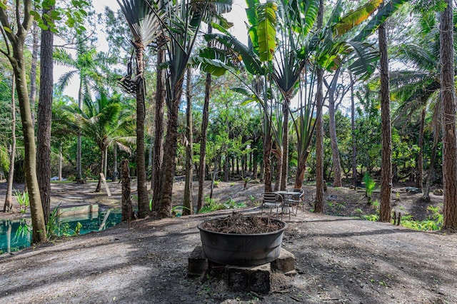 view of patio featuring a fire pit