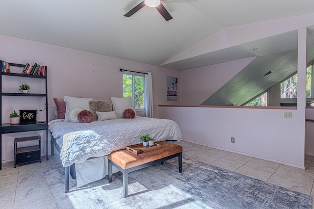 bedroom with vaulted ceiling and ceiling fan