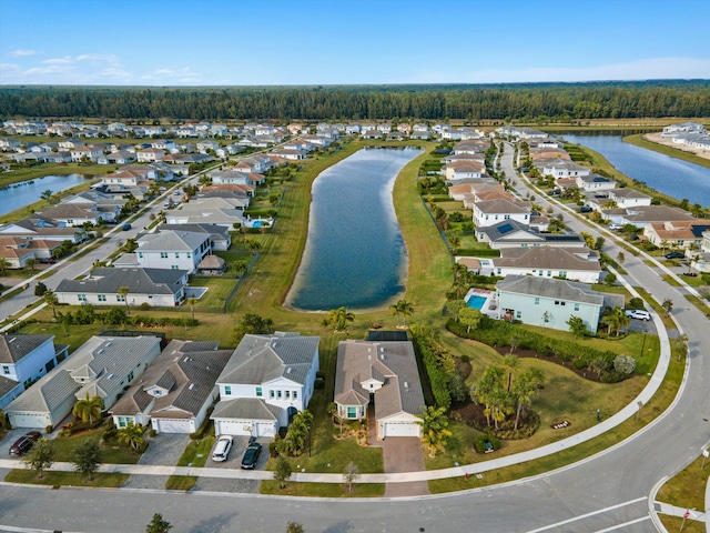 drone / aerial view with a water view