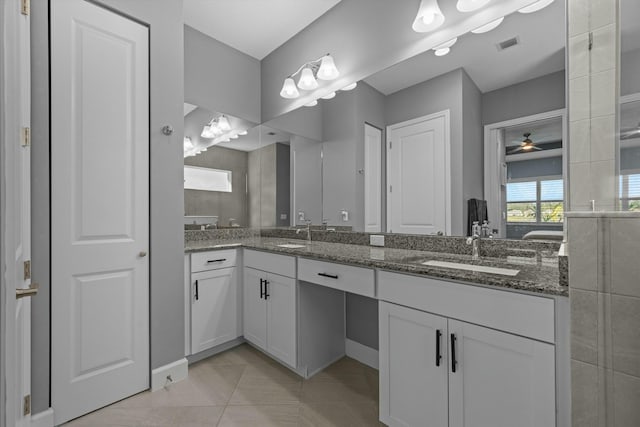 bathroom featuring vanity, tile patterned floors, and ceiling fan