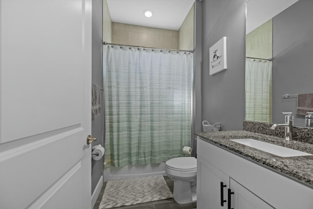 full bathroom with vanity, toilet, and shower / bath combo with shower curtain