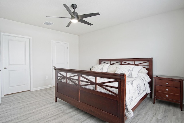 bedroom featuring ceiling fan and light wood-type flooring