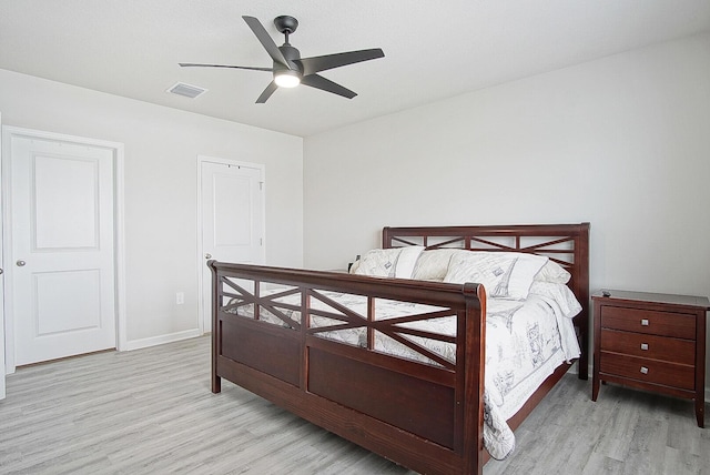 828 Persimmon Pl, Fort Pierce, FL 34981 - bedroom with light wood-style flooring, baseboards, and a ceiling fan