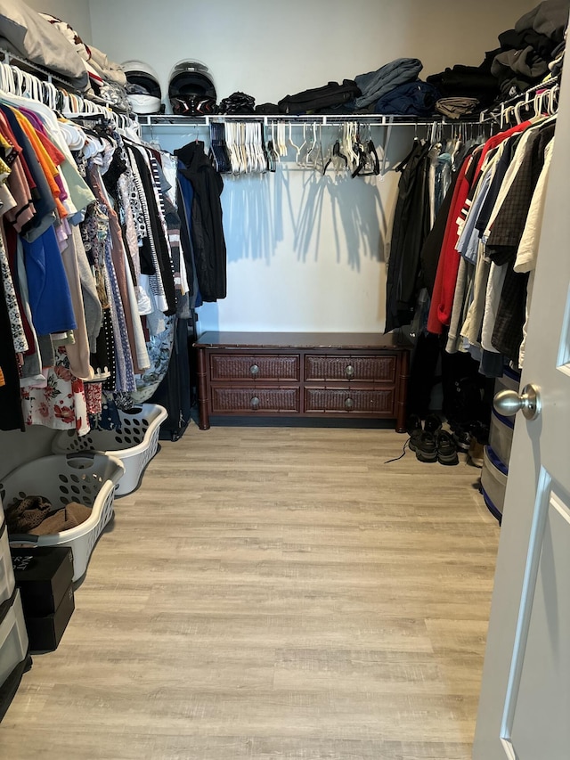 828 Persimmon Pl, Fort Pierce, FL 34981 - walk in closet featuring wood finished floors