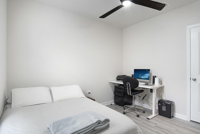 bedroom featuring ceiling fan and light hardwood / wood-style flooring