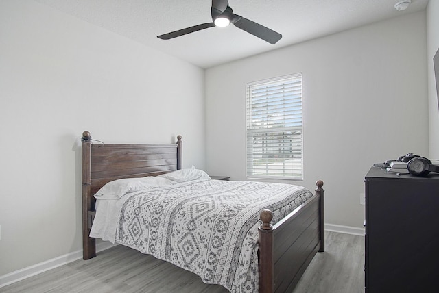 828 Persimmon Pl, Fort Pierce, FL 34981 - bedroom with light wood-style flooring, baseboards, and ceiling fan