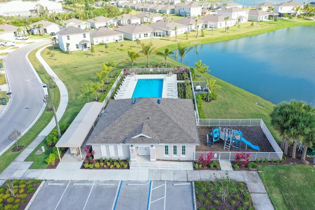 drone / aerial view with a water view