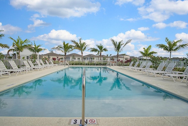 view of swimming pool featuring a patio area