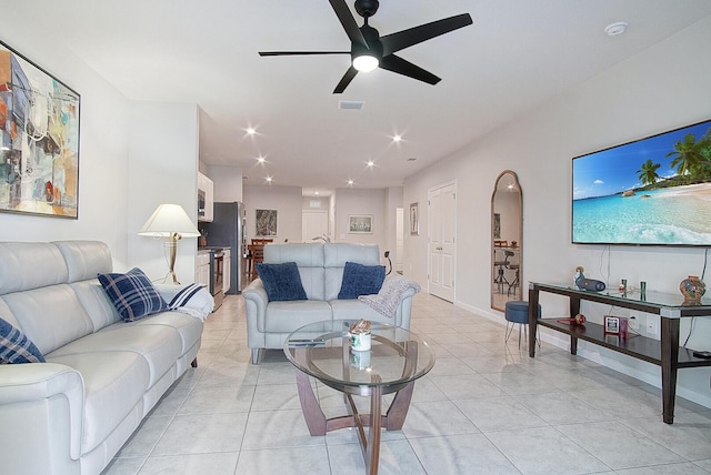 828 Persimmon Pl, Fort Pierce, FL 34981 - living area with a ceiling fan, light tile patterned floors, recessed lighting, and baseboards