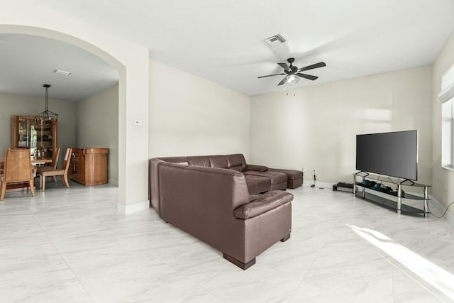 living room featuring ceiling fan